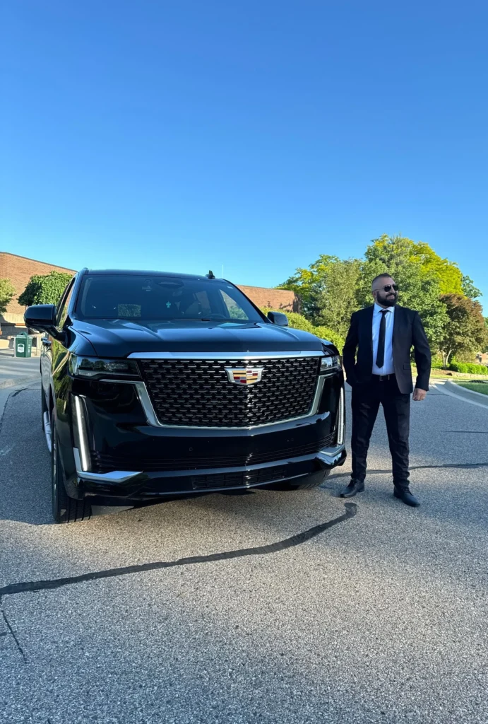 Chauffeur with Cadillac Escalade for car service in Bridgman MI